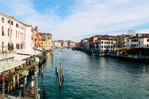 Grand Canal in Venice on a sunny day, Italy. Venice in the sunlight. Scenic panoramic view of Venice in winter. Cityscape and landscape of Venice. Romantic water trip. © Hanna