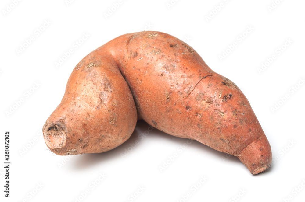 closeup of sweet potatoes on white background closeup of sweet potatoes on white background