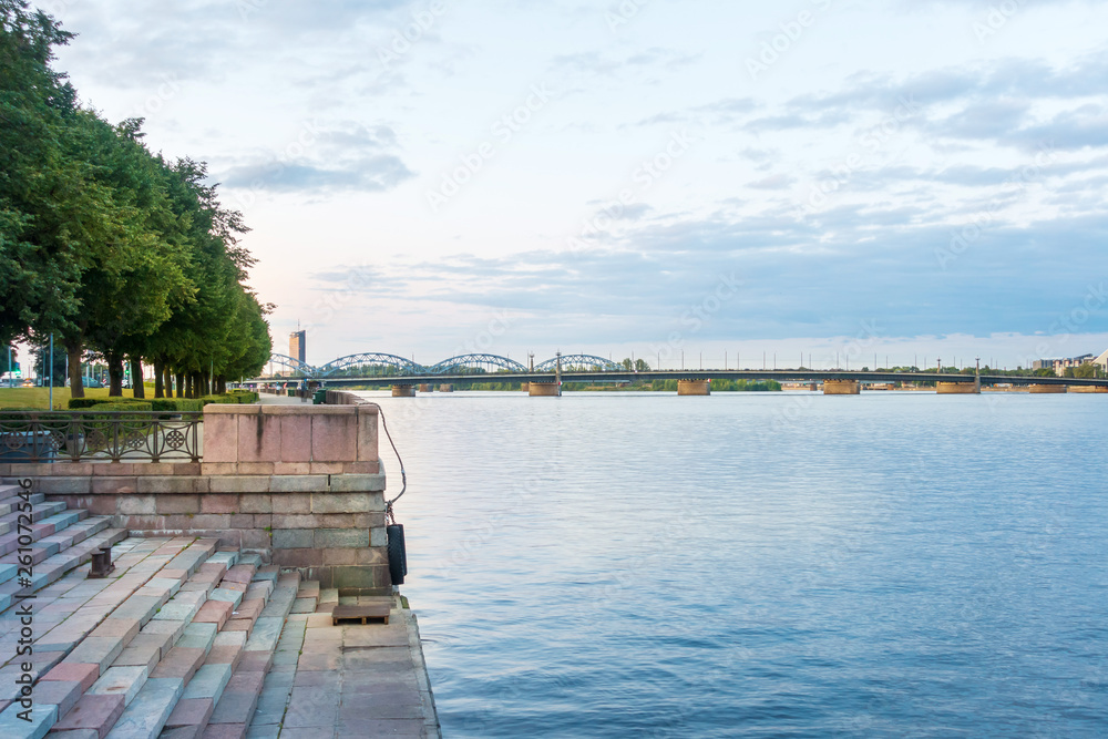 RIGA, LATVIA - August 28, 2017: The Vansu Bridge in Riga is a cable-stayed bridge that crosses the Daugava river in Riga RIGA, LATVIA - August 28, 2017: The Vansu Bridge in Riga is a cable-stayed bridge that crosses the Daugava river in Riga