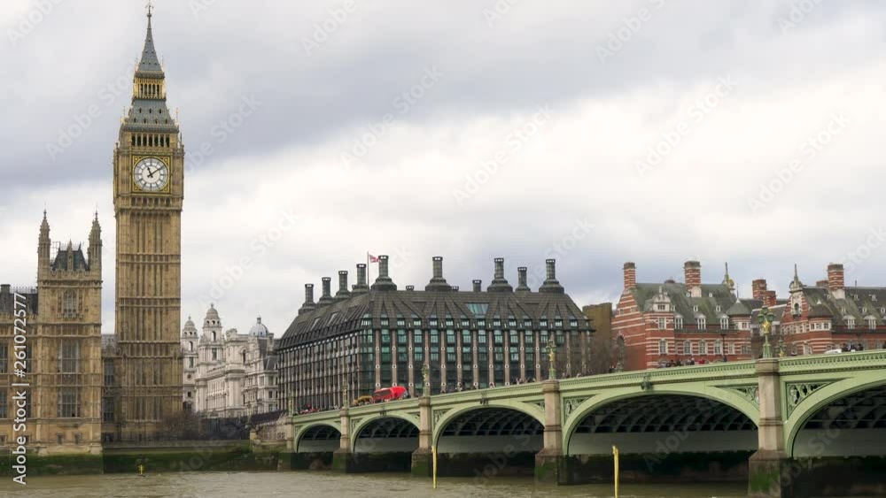 4K video of red buses, traffic and people on Westminster Bridge over the River Thames next to Big Ben and The Houses of Parliament, London, England 4K video of red buses, traffic and people on Westminster Bridge over the River Thames next to Big Ben and The Houses of Parliament, London, England