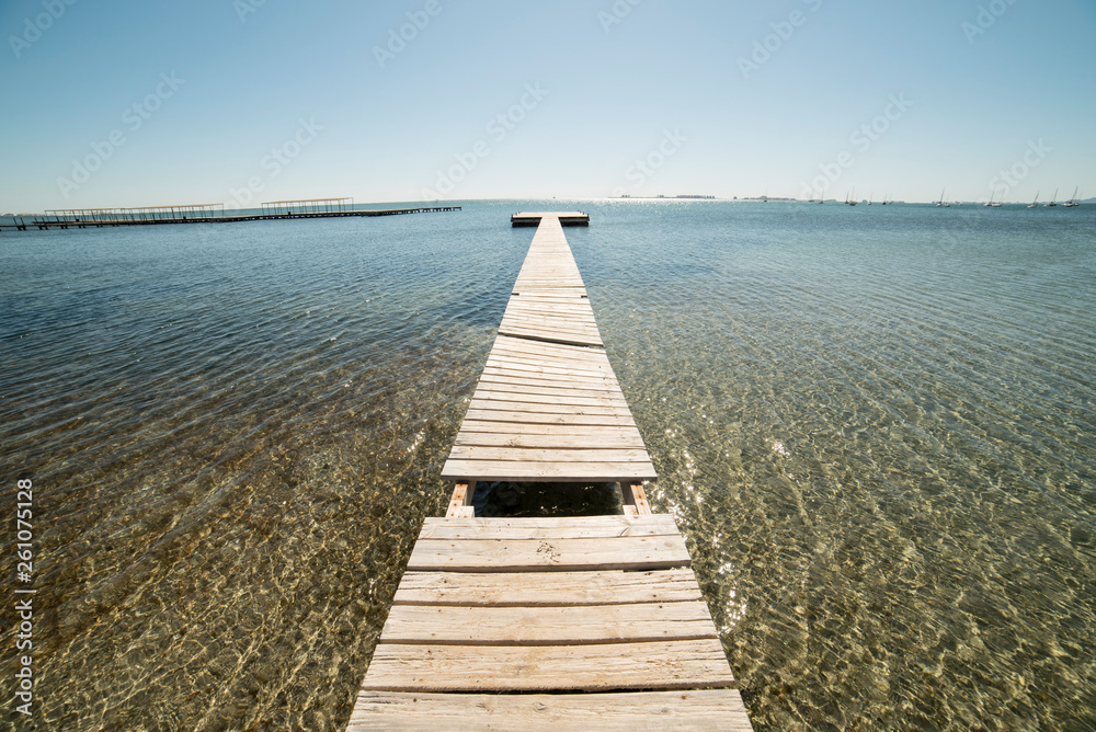 Fototapeta premium Wooden pier in the Mar Menor for light boats in Murcia, Spain