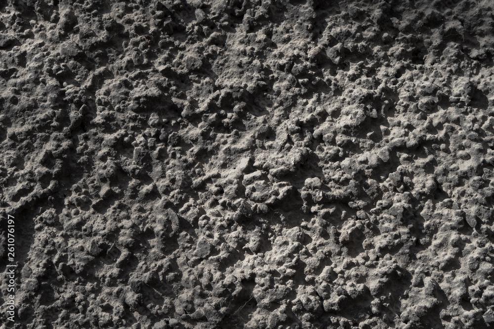 Gray textured wall. Grungy dark background. Gray textured wall. Grungy dark background.