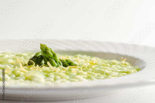 risotto with asparagus. Traditional italian dish  photo