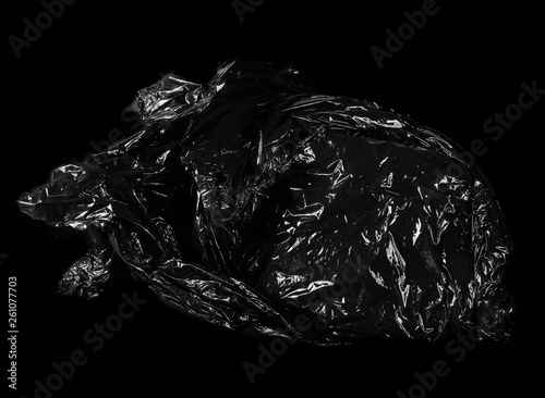 Torn and cut nylon bag isolated on  black background and texture, clipping path 