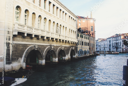 Grand Canal in Venice on a sunny day, Italy. Venice in the sunlight. Scenic panoramic view of Venice in winter. Cityscape and landscape of Venice. Romantic water trip.