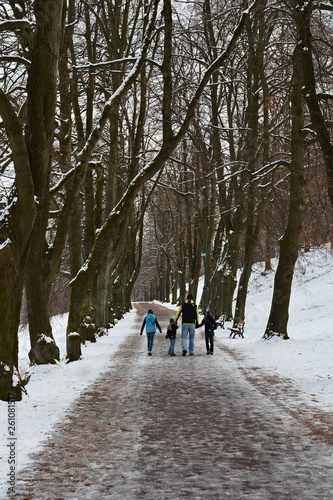 Dad with children on a walk