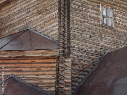 Christian wooden temple closeup. Christian church. Orthodox. Log building. Architectural background. Wooden texture. Ust-Kamenogorsk (Kazakhstan) photo