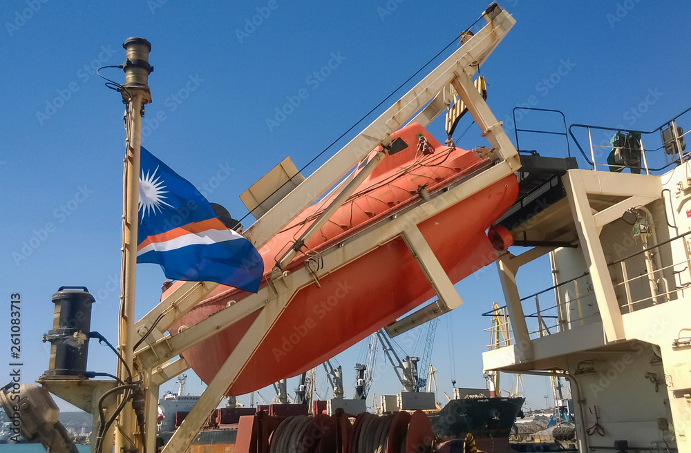 Fototapeta premium A lifeboat in case of an accident in the port or on a ship. The