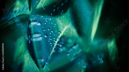 Green blue abstract geometric glass with water babbles. Abstract pictorial background.