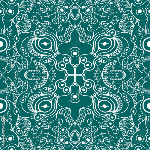 Seamless pattern with two axes of symmetry depicting aquatic creatures in an aqua color background. The monsters and other mirrored beings form whimsical decorative figures photo