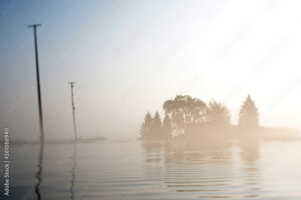 Layers of Fog Over A Lake and Small Islands Layers of Fog Over A Lake and Small Islands