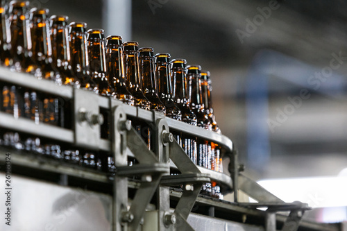 Brewery: Empty Bottles Move Through Production Bottling Line photo