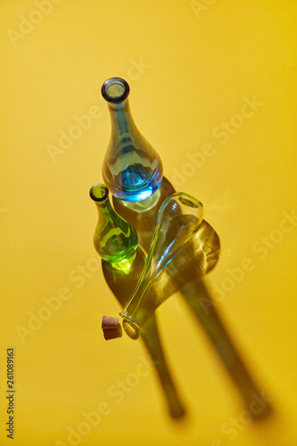 Top view of three glass bottles with cork without water empty wi photo