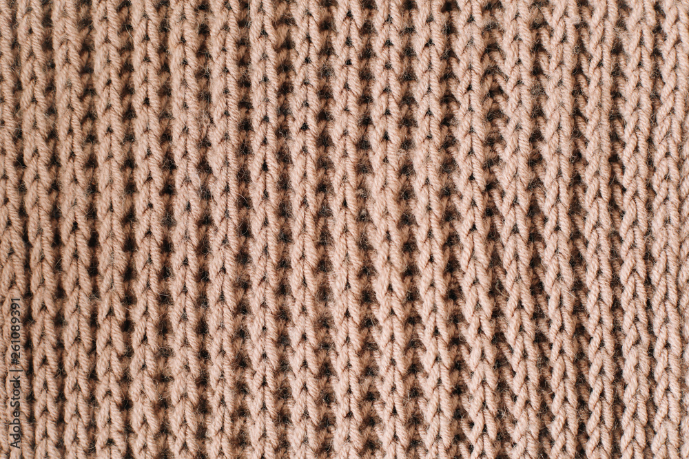 Knitted background. Knitted texture. Knitting pattern of wool. Knitting. Background. close-up Knitted background. Knitted texture. Knitting pattern of wool. Knitting. Background. close-up