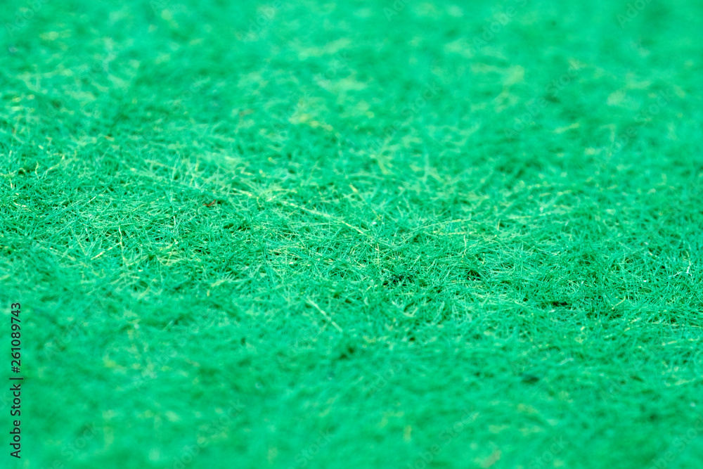 Green pile. Texture with low depth of field. Football artificial field. Green pile. Texture with low depth of field. Football artificial field.