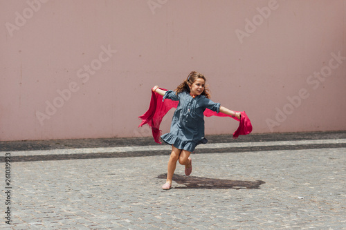 Girl Pretends Flying photo