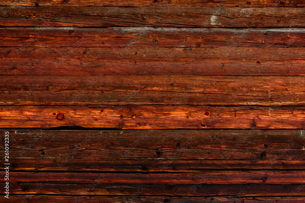 Fototapeta premium Horizontal boards of dark color, wall, texture.