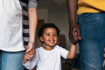 Happy family having fun in home.