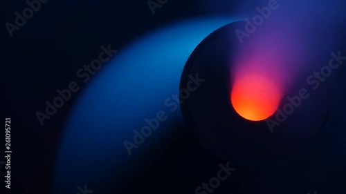 working a humidifier with a red circular light in the middle