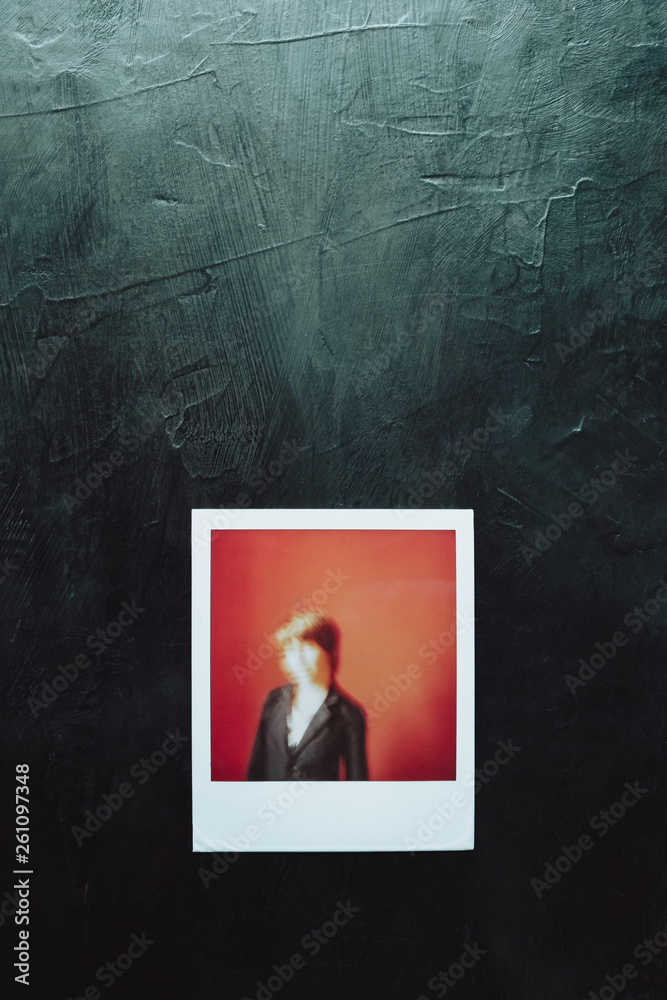 Polaroid portrait of a blurry boy