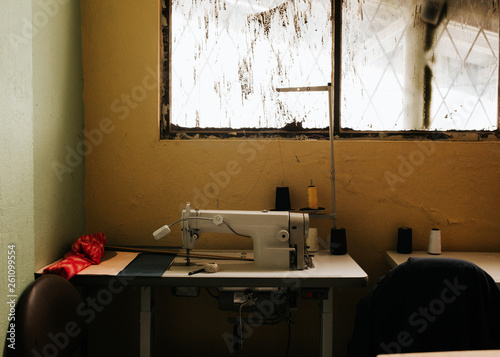 Sowing machine in dusty room photo