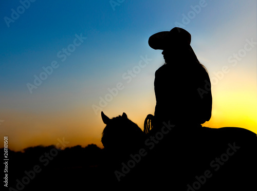 Cowgirl at Sunset