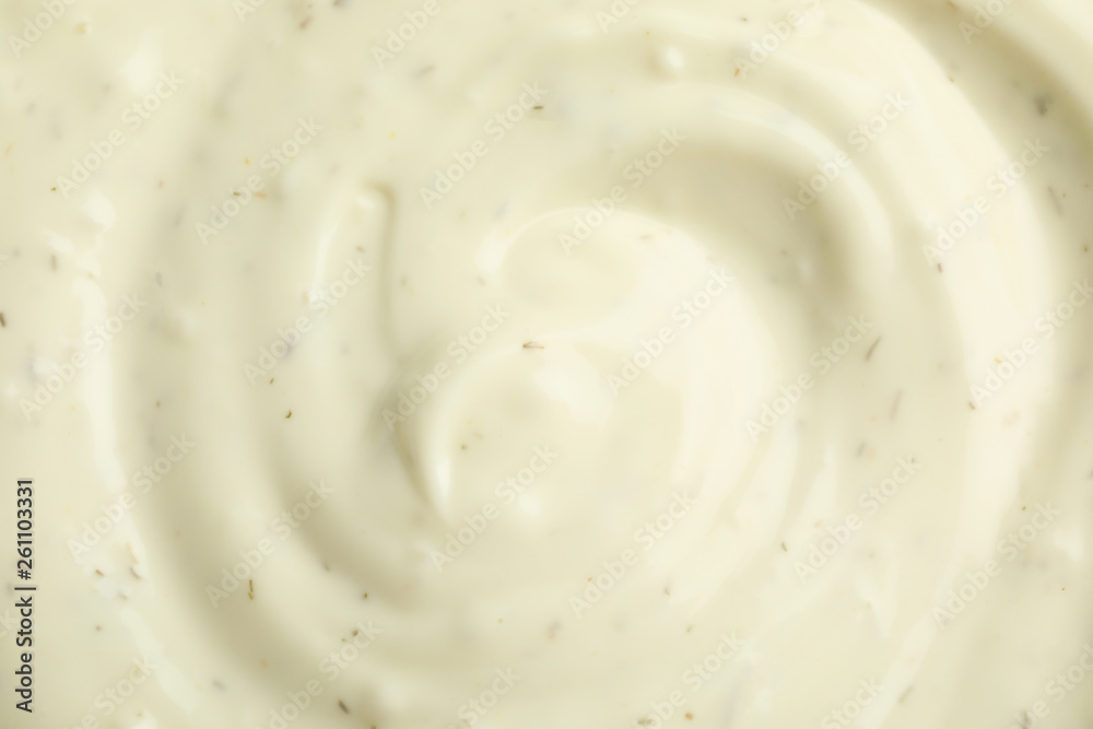 Tasty homemade garlic sauce as background, top view Tasty homemade garlic sauce as background, top view