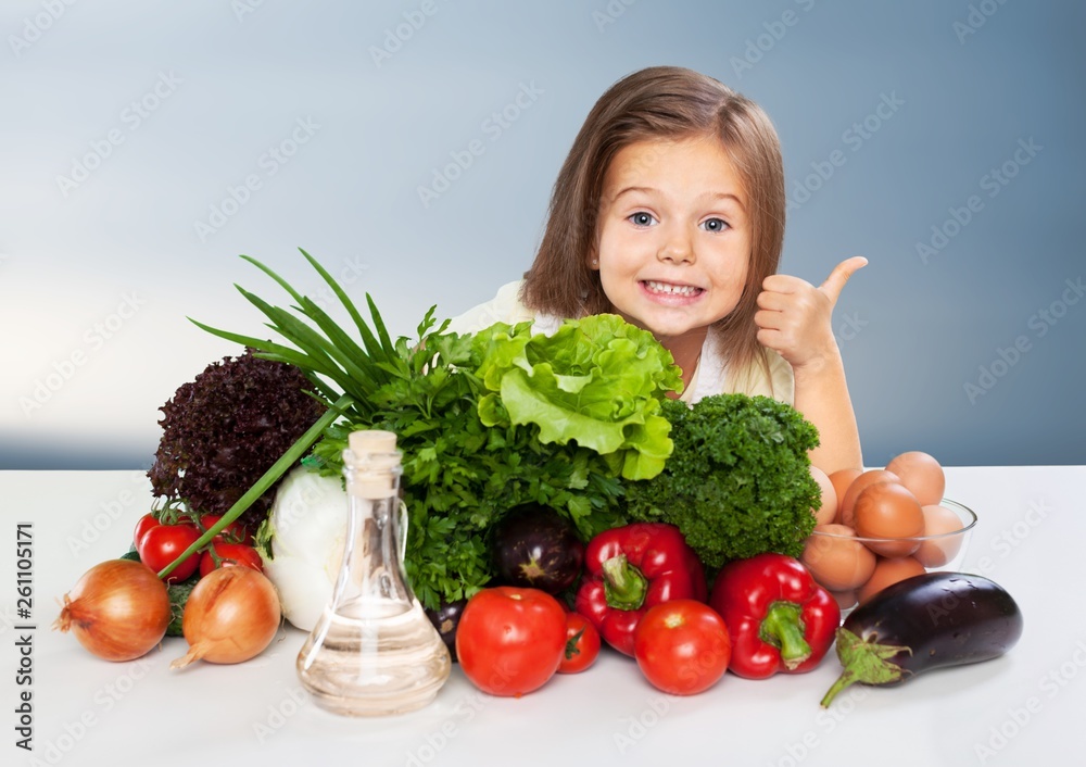 Portrait of adorable little girl preparing healthy food at kitchen Portrait of adorable little girl preparing healthy food at kitchen