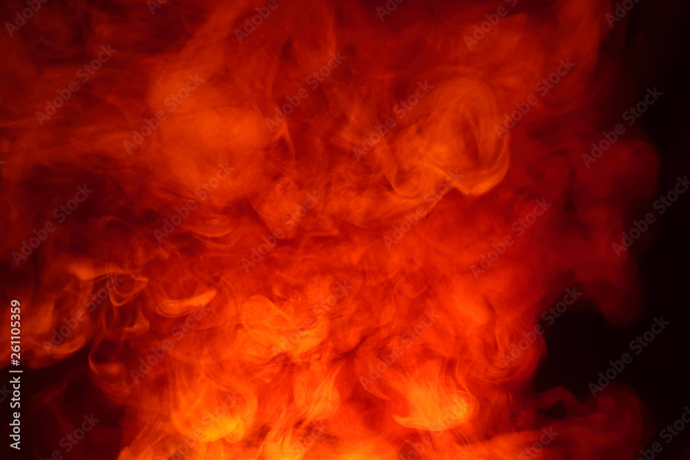 Imitation of bright flashes of orange-red flame. Background of abstract colored smoke. Imitation of bright flashes of orange-red flame. Background of abstract colored smoke.