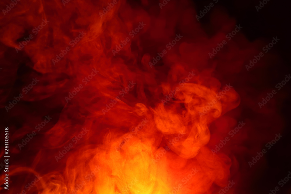 Imitation of bright flashes of orange-red flame. Background of abstract colored smoke. Imitation of bright flashes of orange-red flame. Background of abstract colored smoke.