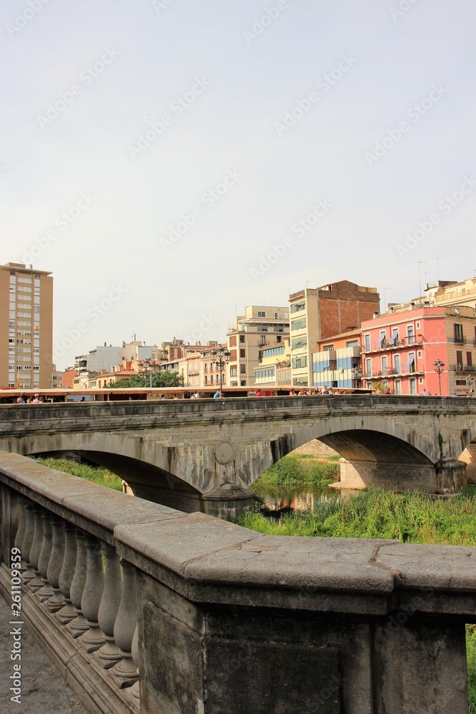 View of the bridge channel in Girona, Spain.