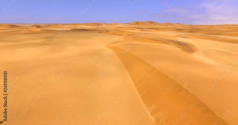 NAMIB-NAUKLUFT NATIONAL PARK, NAMIBIA. Aerial 4K view of beautiful African country with endless sand dunes. The Sossusvlei Dunes of the ancient Namib Desert. NAMIB-NAUKLUFT NATIONAL PARK, NAMIBIA. Aerial 4K view of beautiful African country with endless sand dunes. The Sossusvlei Dunes of the ancient Namib Desert.