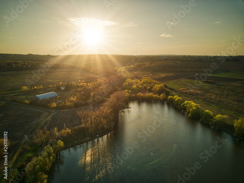 top view small lake with sunset light