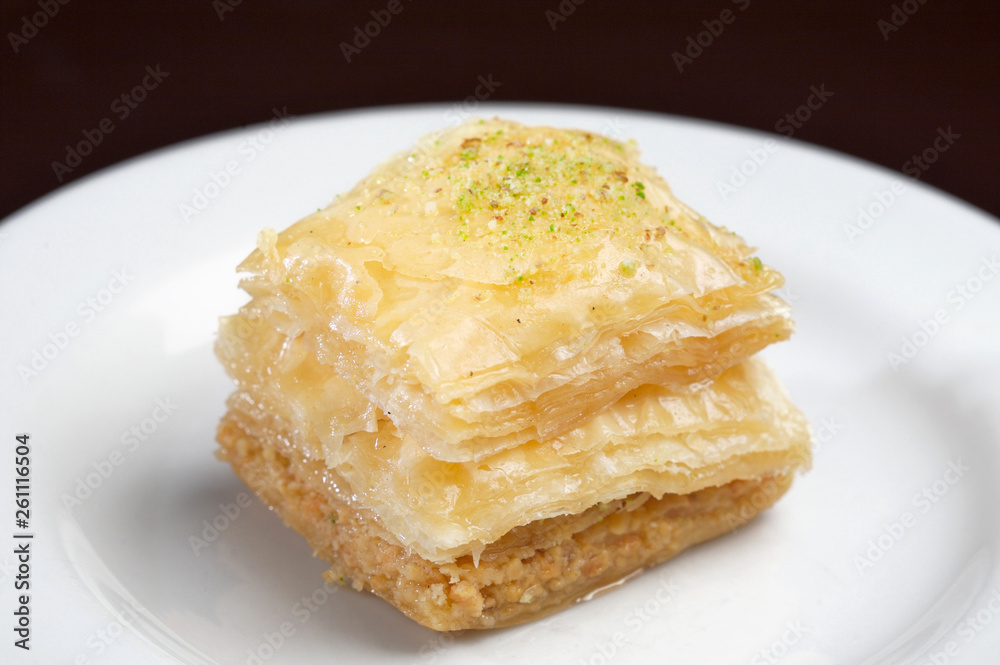 Turkish cake made with a paste of pistachios or crushed nuts. Turkish cake made with a paste of pistachios or crushed nuts.
