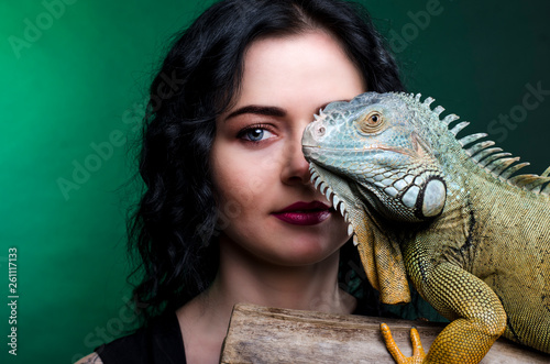 sensual woman and dragon in studio