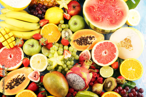 Tropical fruits background  many colorful ripe fresh tropical fruits
