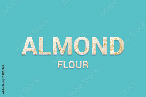 Almond flour texture text on blue background. Typography of Super foods. Vegan, Super food and detox food.
