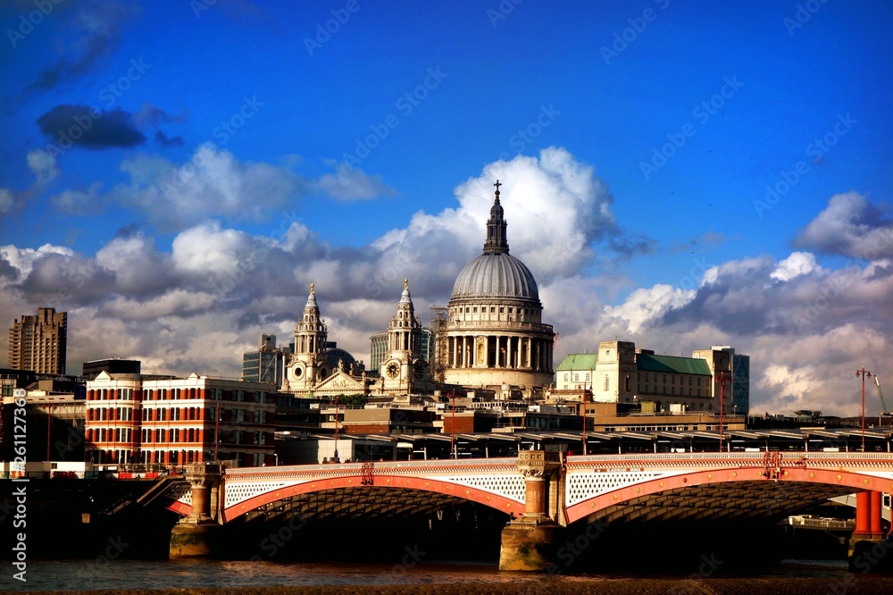 Iconic view of London skyline in summer, St Pauls cathedral, classic urban architecture, Thames river view