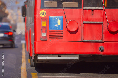 Public transportation / bus in urban surroundings on the street.