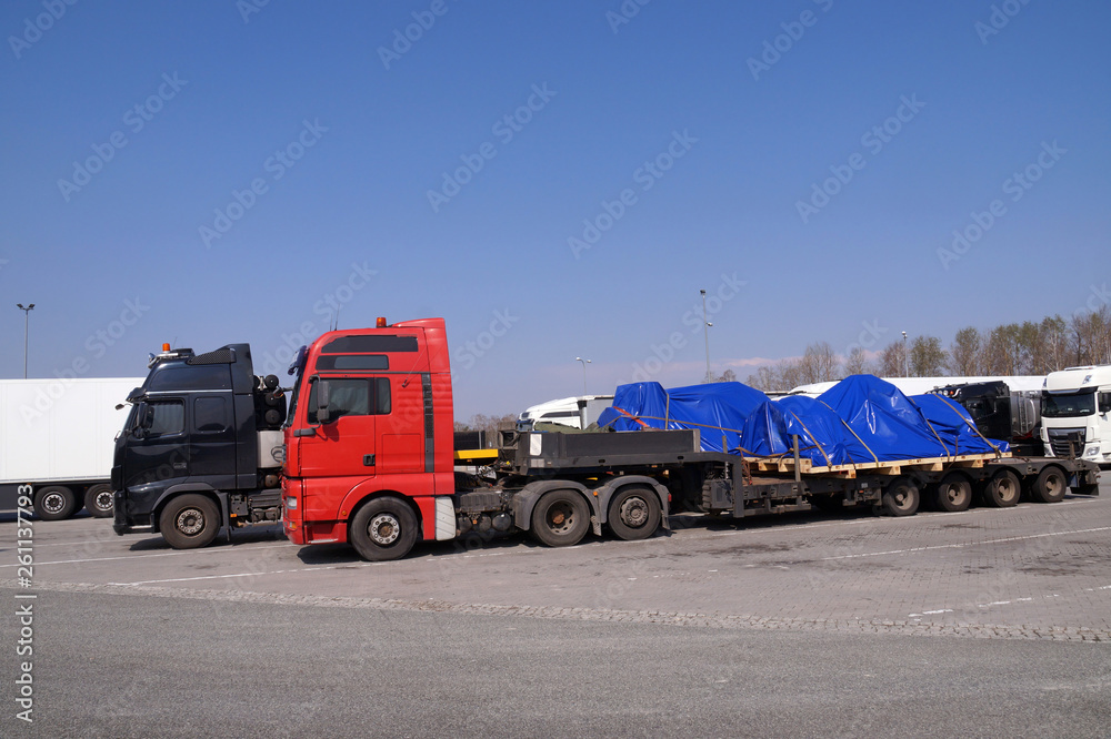Oversize Load or exceptional convoy. A truck with a special semi-trailer for transporting oversized loads.