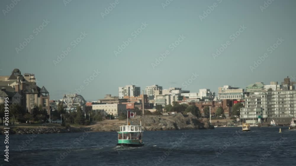 A Water Taxi in Victoria British Columbia Travels Through a Windy Canadian Harbour A Water Taxi in Victoria British Columbia Travels Through a Windy Canadian Harbour