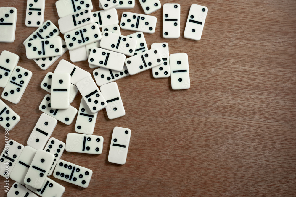 Domino chips with wooden background Domino chips with wooden background