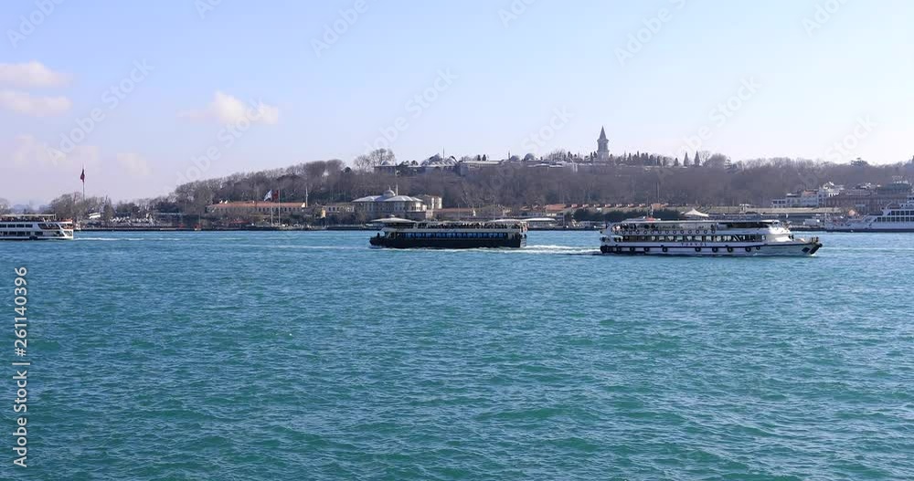ISTANBUL, TURKEY- JANUARY 7, 2019 : Passenger ships and boats cruising over Bosporus at sunny spring day ISTANBUL, TURKEY- JANUARY 7, 2019 : Passenger ships and boats cruising over Bosporus at sunny spring day
