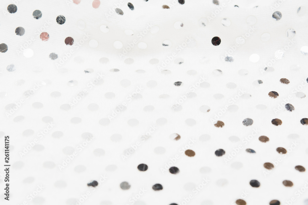 Glamour fabric textile material with silver metal sequins. Glitter shiny background