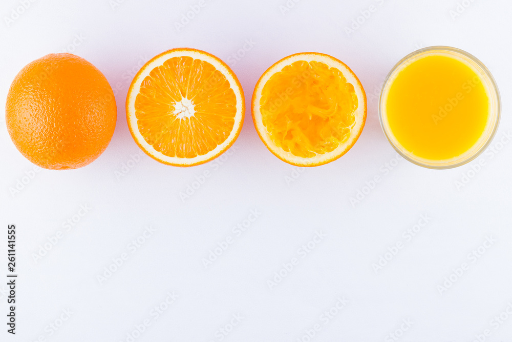 Orange fruits with juice, concept. Orange juice and halves of oranges on white background. Citrus for making juice. Whole and squeezed oranges and glass of juice Orange fruits with juice, concept. Orange juice and halves of oranges on white background. Citrus for making juice. Whole and squeezed oranges and glass of juice