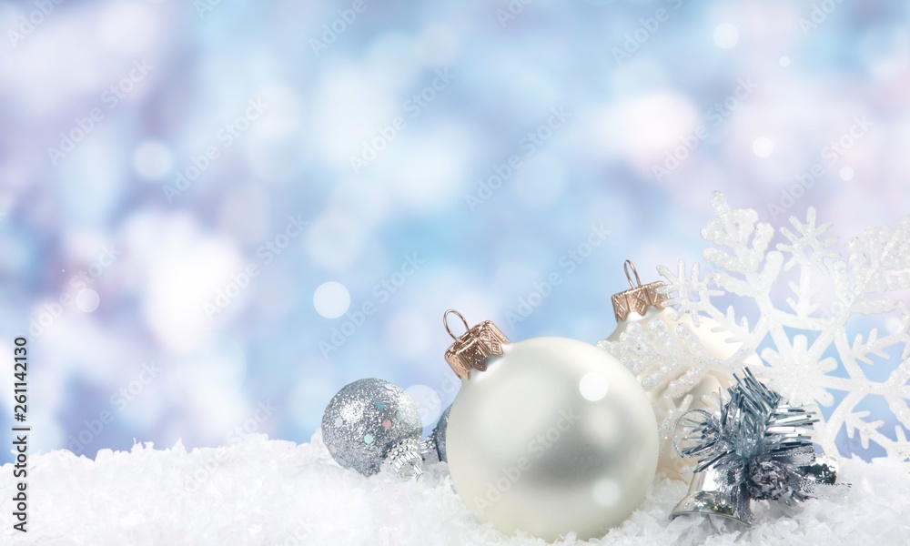 Silver shiny christmas balls in snow isolated on white background. Banner Silver shiny christmas balls in snow isolated on white background. Banner