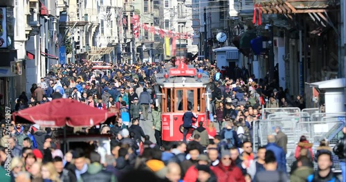 Wallpaper Mural ISTANBUL, TURKEY- JANUARY 7, 2019 :  A view of crowded walking on famous Taksim Istiklal Avenue at winter time Torontodigital.ca