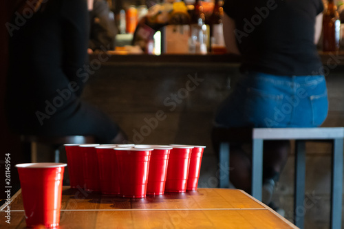 Table to play Beerpong, red and blue cups