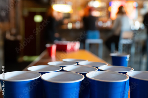 table to play Beerpong, red and blue cups
