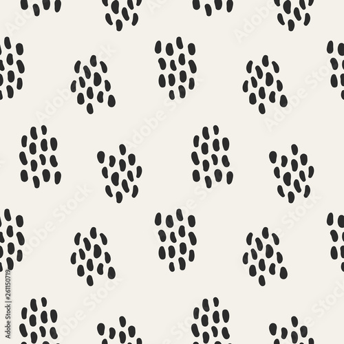 Seamless vector pattern with hand drawn organic shapes in black and white. Decorative dotty texture for print  textile  packaging  wrapping  or web use.